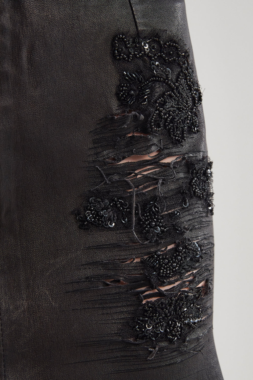 RIPPED LEATHER SKIRT