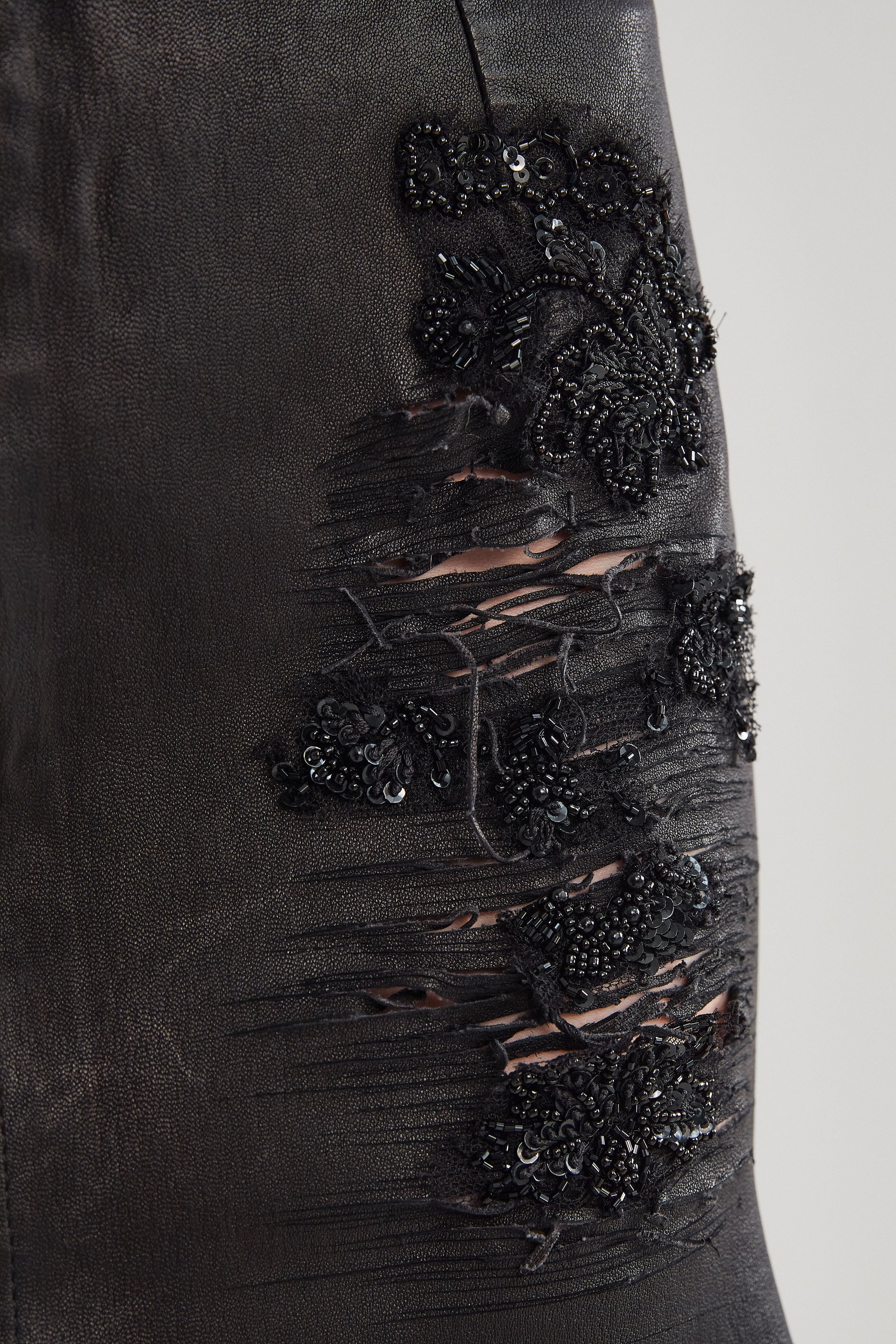 RIPPED LEATHER SKIRT